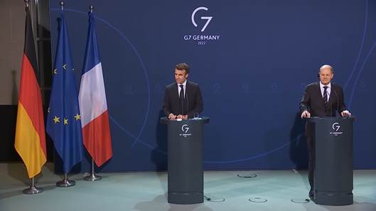 French President Emmanuel Macron and German Chancellor Olaf Scholz. Photo: Screenshot / Elysee