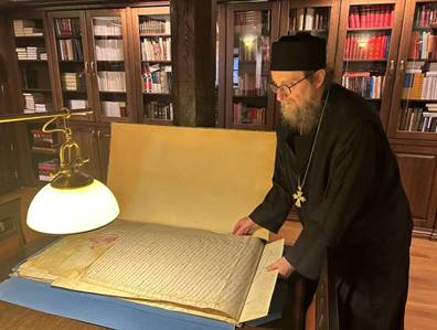 Abbot of Decani, Father Sava, in the monastery’s library. Photo: ESI